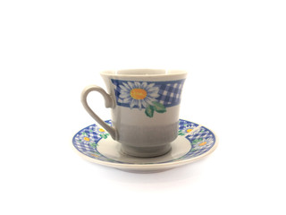 Tea cup and saucer isolated on a white background. Set of cup and saucer for tea.  Old cup with a pattern. Empty cup and saucer. 