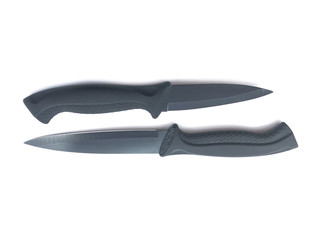 Knife composition isolated on a white background. Set of black matte knives. Paring knife and utility knife. Sharp blade.