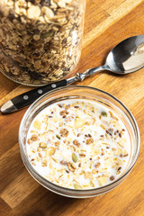 Healthy cereal breakfast. Muesli in the bowl of milk