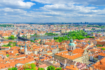 Naklejka na ściany i meble Top aerial panoramic view of Prague historical city centre with red tiled roof buildings in Mala Strana Lesser Town and Old Town, Charles Bridge Karluv Most over Vltava river, Bohemia, Czech Republic