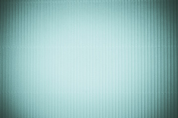 Corrugated blue color paper background texture, copy space, template. Colorful background, corrugated paper cardboard, copy space, template.
