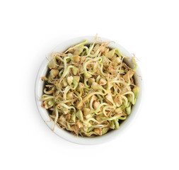 Bowl of sprouted green buckwheat isolated on white, top view