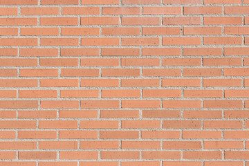 solid brick wall in orange