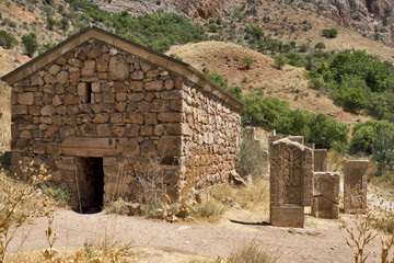 Armenia, Noravank: cross stones in the midday heat