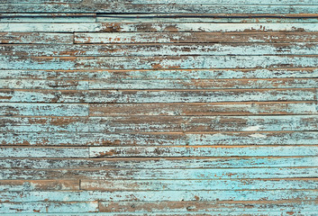 blue color wooden old board, horizontal planks. turquoise grunge rough painted wooden fence. wooden plank background. template for design