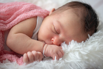 Portrait of a little newborn girl