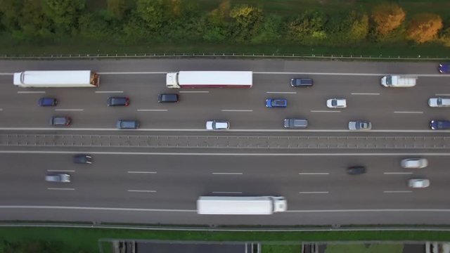 Aerial drone shot of vehicles on Autobahn 81 amidst patchwork landscape