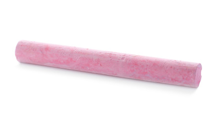 Piece of pink chalk isolated on white