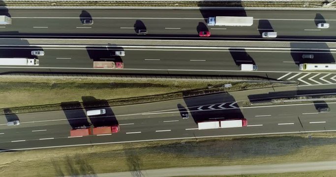 Aerial lockdown shot of vehicles moving on highway junction, Baden-Wuerttemberg, Germany