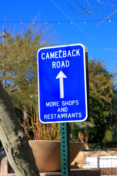 Blue Camelback Road direction sign in the Southbridge District of Scottsdale AZ