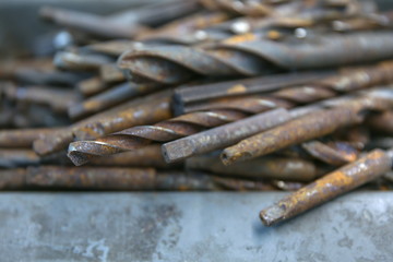 rusty drills in box close up