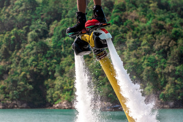 Man on flyboard on nature background © thomsond