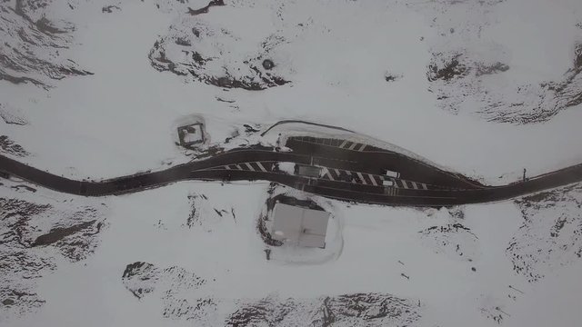 Aerial view of snow covered mountain road, Spluegen Pass