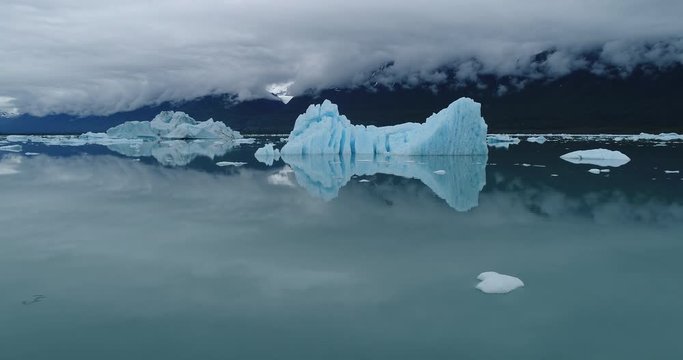 Drone footage of people kayaking towards glacier, Alaska, USA