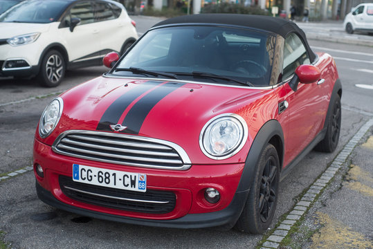 Mulhouse - France - 5 February 2020 - Front view of red mini cooper convertible parked in the street