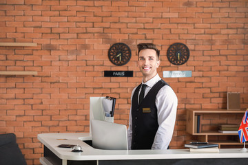 Portrait of male receptionist in hotel