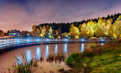 Fototapeta premium Moscow. October 06, 2019. Beautiful night landscape with a view of the Meshchersky pond, park and forest