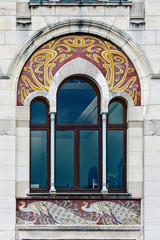 peacock mosaic on the facade of a building in the zoo of Antwerp, Belgium