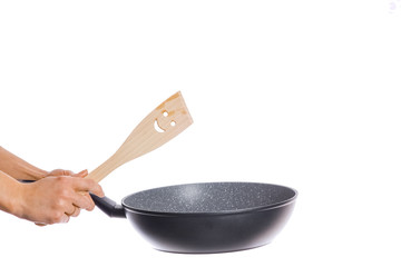 pan in hands on a white background