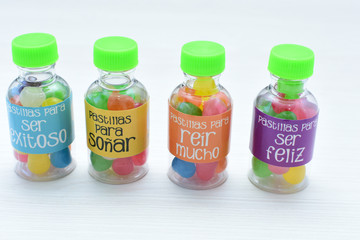 Concept of positive phrases, represented in colorful candies