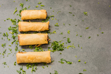 Delicious crispy gold yellow spring rolls for a good meal.