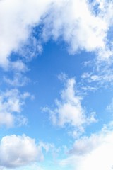 Obraz premium Blue sky background. Blue sky with fluffy white clouds