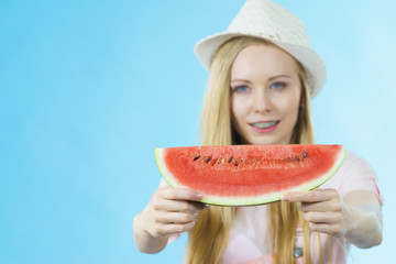 woman holding watermelon fruit