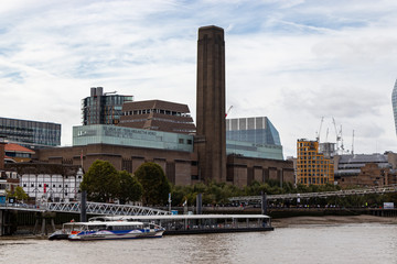 Tate Modern art gallery in South Bank powerstation with the theme in the foreground, London, England, UK