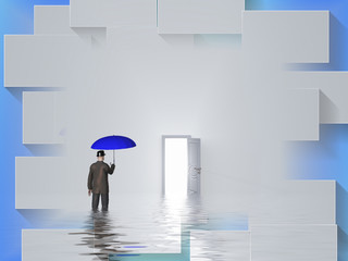 Man with blue umbrella stands in water in white room with open door