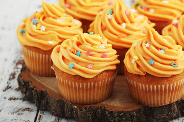 Cupcakes with orange icing on top