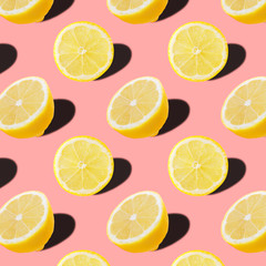seamless food pattern with fresh slice lemon on light pink background