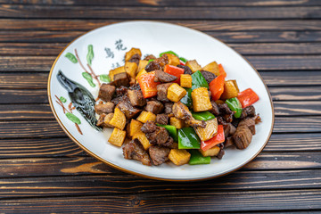 Beef stew with potatoes in a plate.