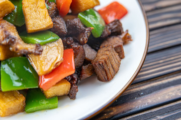 Beef stew with potatoes in a plate.