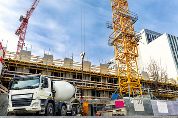 Commercial or residential corporate hightower building construction site with different heavy...
