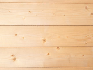 background of three light brown pine wood planks