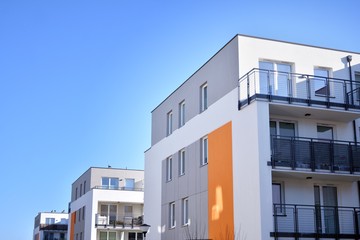 Contemporary residential building exterior in the daylight. Modern and new apartment building. 