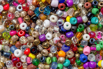 Fototapeta na wymiar Macro photography of a heap of assorted colorful plastic beads