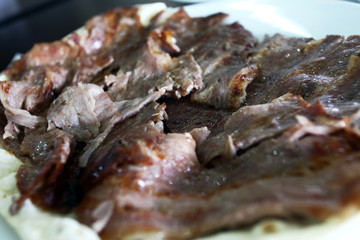 Turkish Doner Kebab with pita in dinner plate