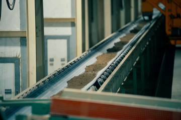 Clay conveyor line for brick production.