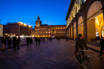 Fototapeta na wymiar People walking in Piazza Maggiore. Bologna. Italy
