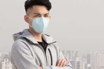 asian man wears protective mask