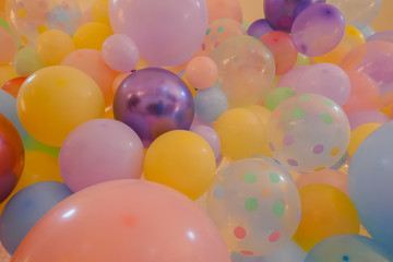 Colored balloons. Helium balloons floating in a birthday party. Birthday party concept