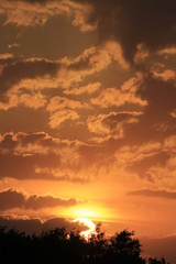 Fototapeta na wymiar sunset in the sky in Kansas west of Hutchinson Kansas USA.