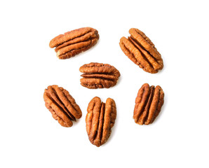 Pecans isolated on white background top view