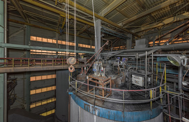 The top of the cylindrical gas treatment reactor with a variety of equipment. Absorption tower...