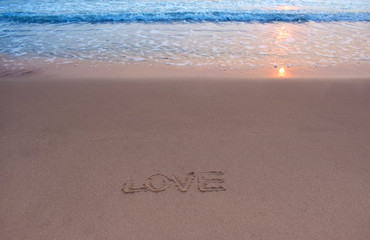  On the sand, there was a letter saying love