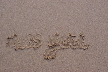  On the sand, there was a letter saying miss you