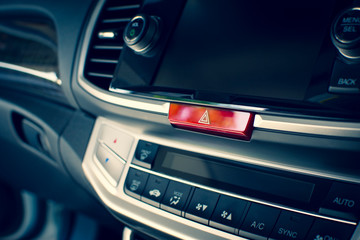 Obraz na płótnie Canvas Car emergency light button on dashboard in a car.