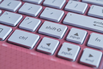 Laptop keyboard with button