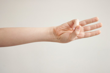 Obraz premium hand of the child on the white background.